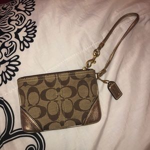 Coach gold wristlet